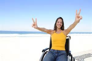 happy woman in wheelchair